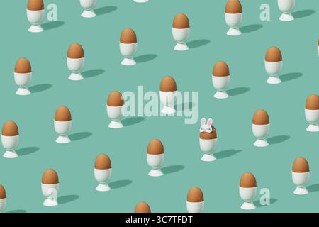 Easter pattern made of eggs in eggcups on pastel green background. One egg in banny sleep mask. Stock Photo