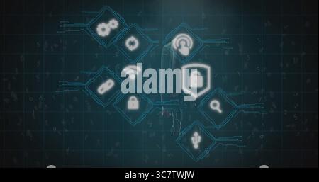 Showing business silhouette in suit standing against teal code grid, with glowing security icons Stock Photo