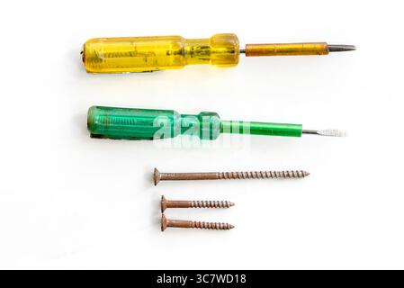Tester and Screw isolated on white background Stock Photo