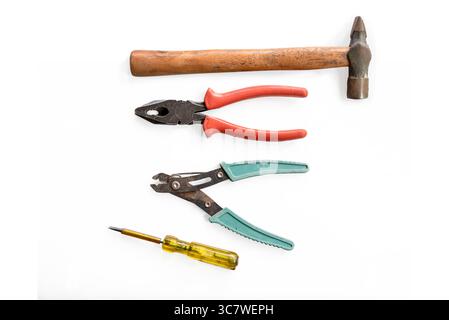 Hammer, Pliers,Tester and wire cutter isolated on white background Stock Photo