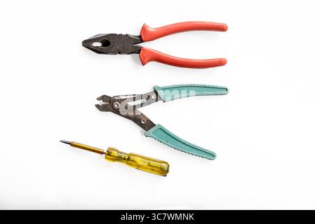 Pliers,Tester and wire cutter isolated on white background Stock Photo