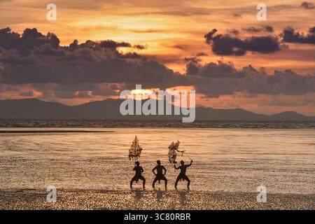 Silhouette of three men performing Traditional Thai Shadow Puppet Show ...