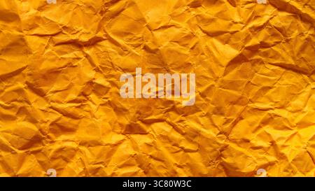 Crumpled Golden Yellow Paper Texture Background Abstract Pattern Stock Photo