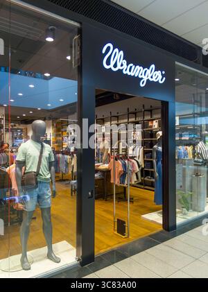 Banska Bystrica, Slovakia - July, 19, 2025 : Wrangler store front in the shopping mall.  Wrangler is an American manufacturer of jeans. Stock Photo
