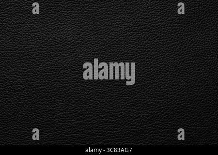 black leather background, natural hide texture closeup Stock Photo