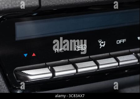 Climate control buttons in modern car macro close up view Stock Photo