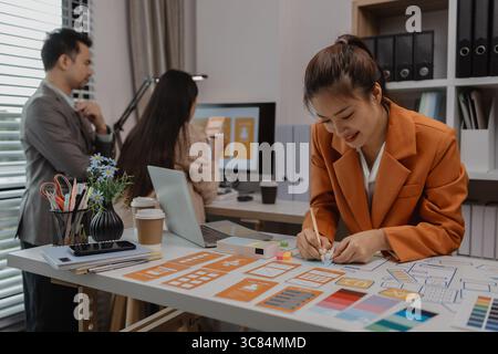 drawing website ux ui app for mobile phone application and development template layout, UI development, designer team working on a project of ux ui in Stock Photo