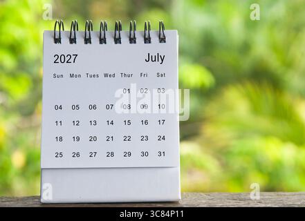 July 2027 calendar with blurred nature background. Copy space Stock Photo