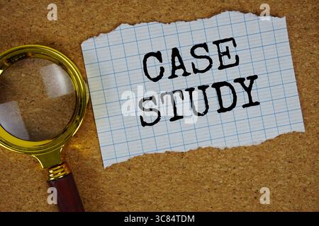 Case Study text written on paper with magnifying glass Stock Photo