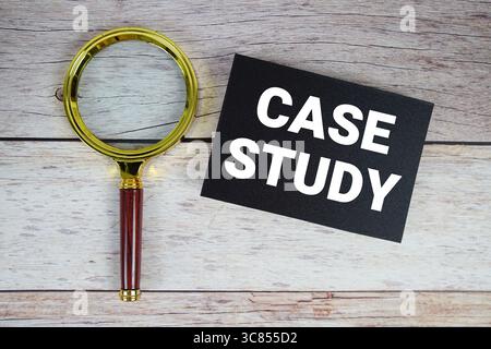 Case Study text written on paper with magnifying glass Stock Photo