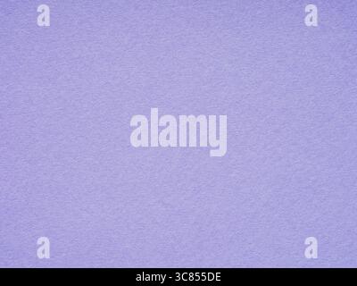 Lavender's soft embrace whispers serenity across the textured expanse of a paper's surface Stock Photo