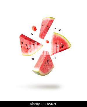 Watermelon pieces isolated with ceeds flying isolated on white. Falling slices set. Red berry splash. Stock Photo
