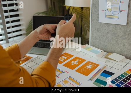 A web developer is analyzing data from his ideas to develop the structure and components of a digital product that best meets the needs of users, ux, Stock Photo