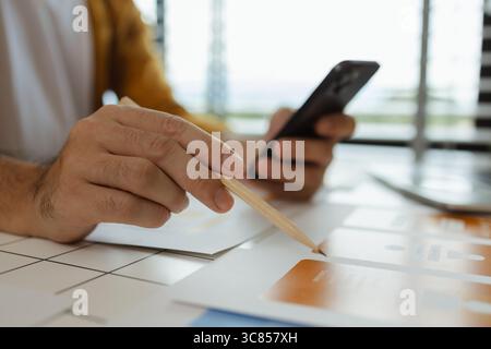 A web developer, as a User Experience and User Interface Officer is analyzing data from his ideas to develop the structure and components of a digital Stock Photo