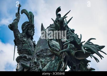 View of the famous bronze statue of Saint George fighting with the dragon in Gamla stan in Stockholm Stock Photo