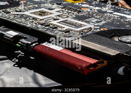 High-Resolution Close-Up of Laptop Cooling Fans, Circuit Board, and Components in Bright Technical Lighting Stock Photo