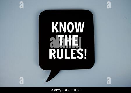 Know The Rules! text with speech bubble top view on blue background Stock Photo