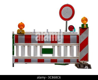 Red and white colored roadblock, isolated on white background Stock Photo