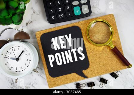 Key Points text with Calculator, alarm clock and magnifying glass on marble background Stock Photo