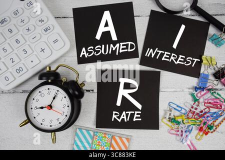 AIR Abbreviation of Assumed Interest Rate text phrase of business and financial concept Stock Photo