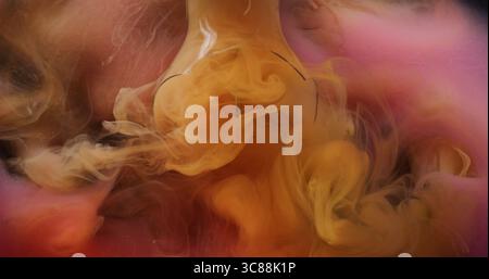 Cracked lamp. Vapor paint. Defocused orange pink color vibrant fluid splash smoke cloud filling cracked glass in water on abstract background. Stock Photo