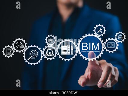 BIM Building Information Modeling Technology Concept. A professional interacts with BIM tech icons, 3D modeling, architecture planning, AI, project Stock Photo