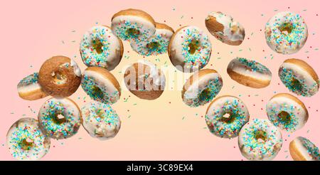 Multiple white glazed donuts with colorful sprinkles falling or flying in a curved path on a gradient pink and yellow background. Stock Photo