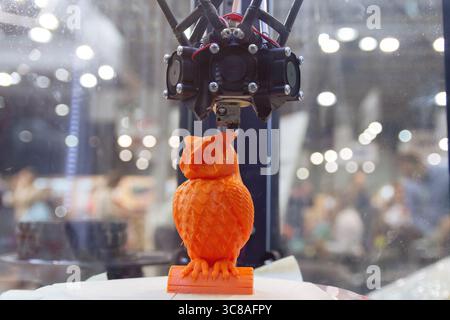 Three dimensional printing machine in operation,3D printer. Industry Stock Photo