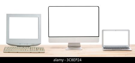 Conceptual workspace or business concept. Laptop computer, retro CRT monitor and big computer monitor display with blank white screens on light wooden Stock Photo