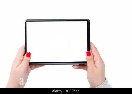 Female hands holding and working with tablet isolated on white. Stock Photo