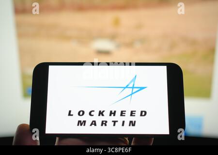 Roosendaal, The Netherlands - August 04, 2025: A mobile phone displaying the company logo of Lockheed Martin, with the company website in the backgrou Stock Photo
