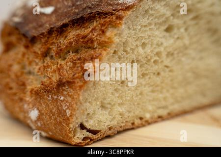 Detailed view of a freshly baked rustic bread slice Stock Photo