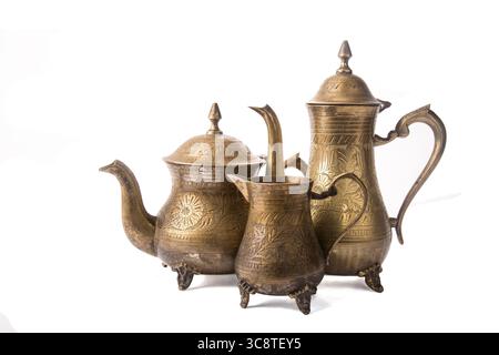 Some turkish vintage coffee pots isolated on white background Stock Photo