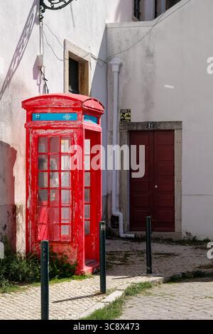 Traditional phone booth in Lisbon, Portugal Stock Photo