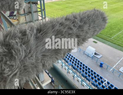 Sound engineer's microphone at a football stadium Stock Photo