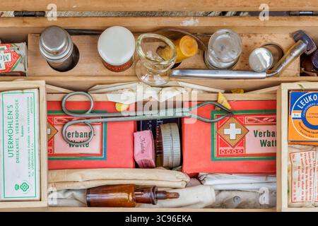 Apeldoorn, The Netherlands - July 17, 2025: Vintage German first aid kit on a flea market in Apeldoorn, The Netherlands Stock Photo