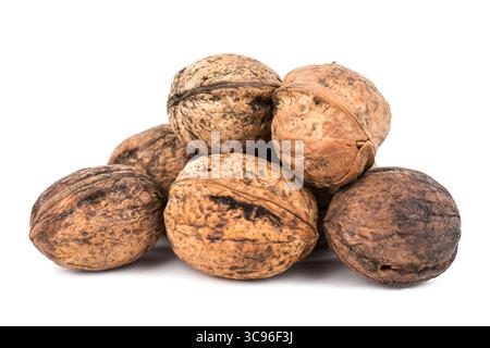 Some walnuts isolated on white background with shadows Stock Photo