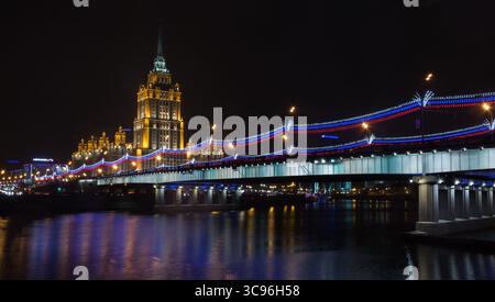 Ukraine hotel (Radisson Royal Hotel) in night illumination. Radisson Royal Hotel - the five-star hotel located in the center of Moscow, in one of Stal Stock Photo