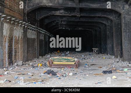 Old Sofa in Abandoned Tunnel Structure With Trash in Belgrade Serbia Stock Photo
