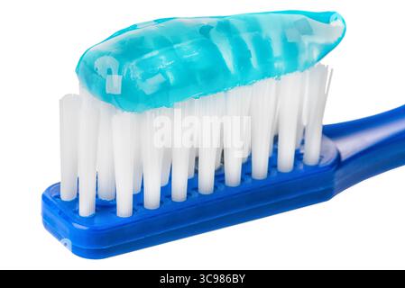 toothpaste on toothbrush extreme macro isolated on white background. Stock Photo