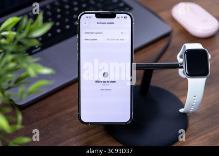 Poznan, Poland - July 29, 2025: iOS 26 operating system update, featuring Liquid Glass technology, shown on an iPhone screen for essential digital dev Stock Photo