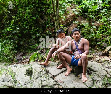 Indigenous Embera men in traditional dress with musical instruments ...