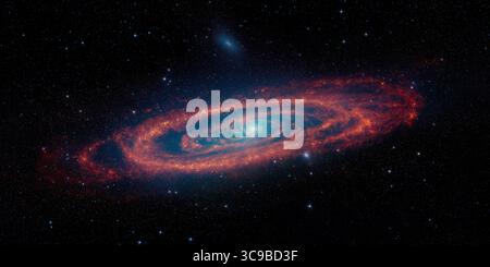 Spiral galaxy in deep space. Andromeda galaxy. Universe filled with stars, nebula and galaxy. Panorama. Elements of this image furnished by NASA. Stock Photo
