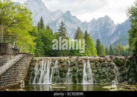 Artificial Waterfall near Lago di Fusine Inferiore, Italy Stock Photo