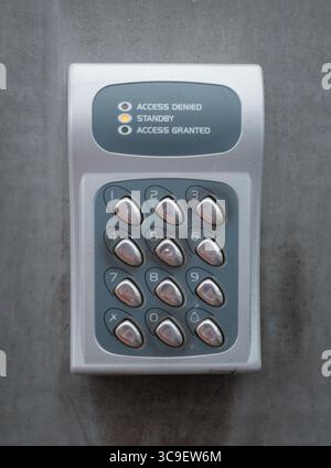 Closeup Of A Grungy Access Control Keypad Stock Photo