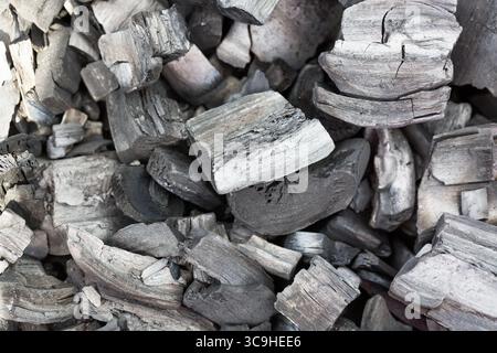 Black charcoal background with selective focus close up.. Stock Photo