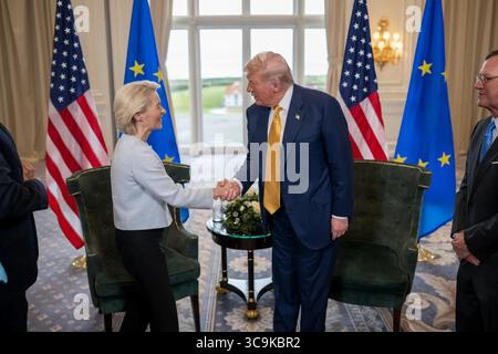Donald Trump shakes hands with European Commission President Ursula von der Leyen during a diplomatic meeting at Trump Turnberry in Scotland. July 27, 2025. Image courtesy of the White House. Stock Photo