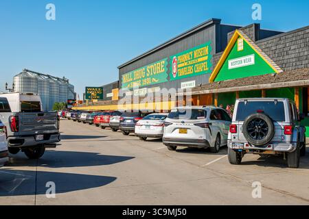 The iconic Wall Drug Store in the Western themed small town of Wall, South Dakota, a popular roadside attraction known for it's numerous billboards. Stock Photo