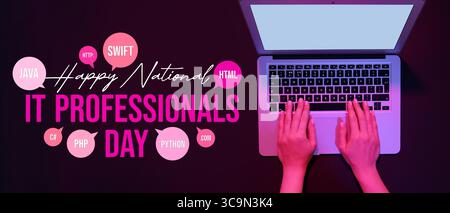 Programmer working with modern laptop on black background. National IT Professionals Day Stock Photo