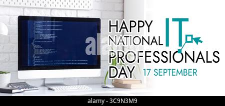 Computer monitor with programming code on desk in office. National IT Professionals Day Stock Photo